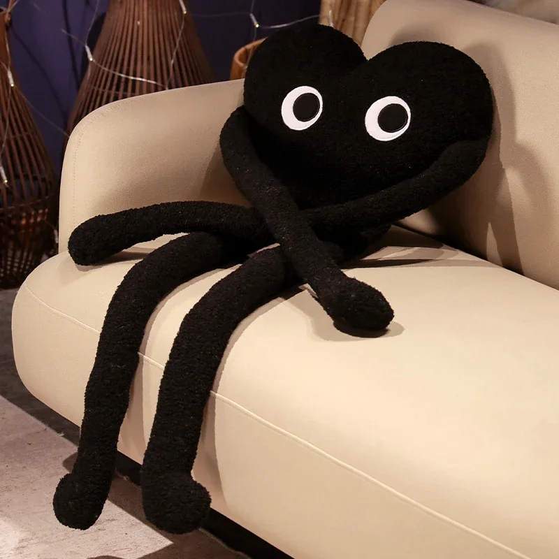 Liebliches und flauschiges Herzkissen mit langen Beinen