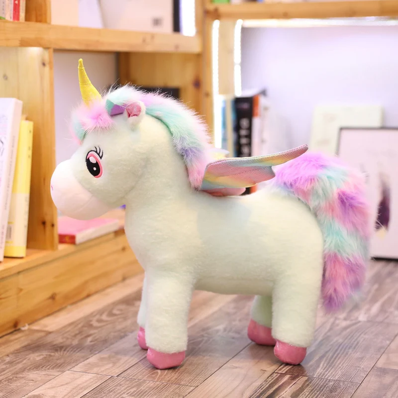 Niedliches Einhorn mit Flügeln Stofftier