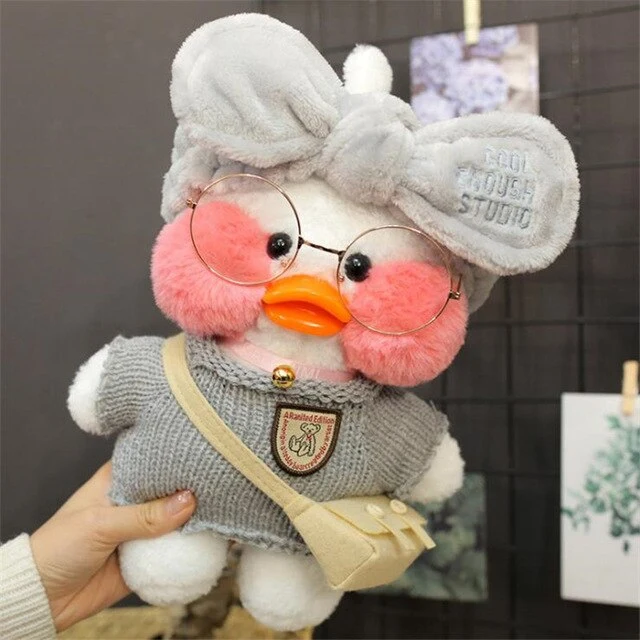 Niedliche Ente Stofftier mit Brille und Accesoires