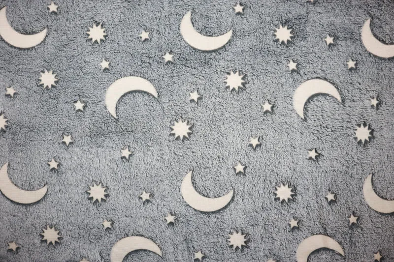 Wellnessfleece Glow in the Dark Sonne, Mond + Sterne