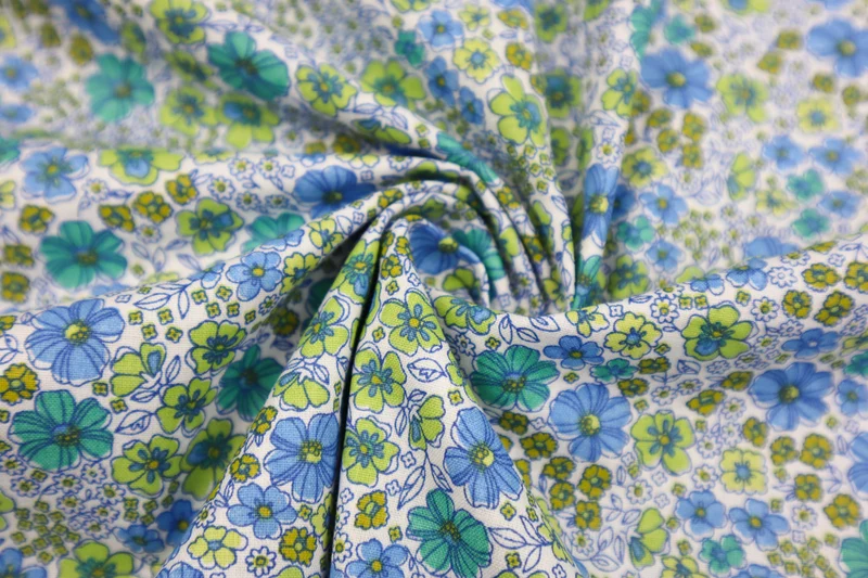 Baumwollstoff Blumenwiese - blau/grün